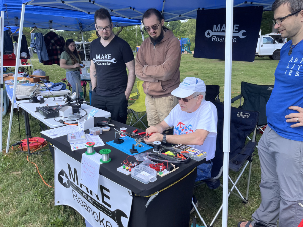 Chris, Max, David, and Hristo working our booth at the Clean Valley Council's Reduce Reuse Repair Fair
