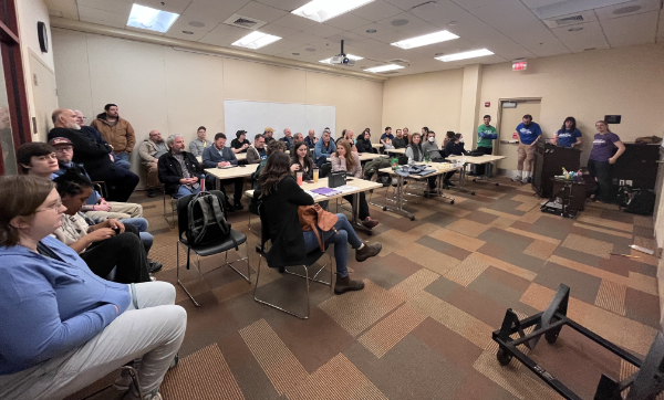 A picture of all the attendees of our first community meeting, taking place in a meeting room of the South County Library